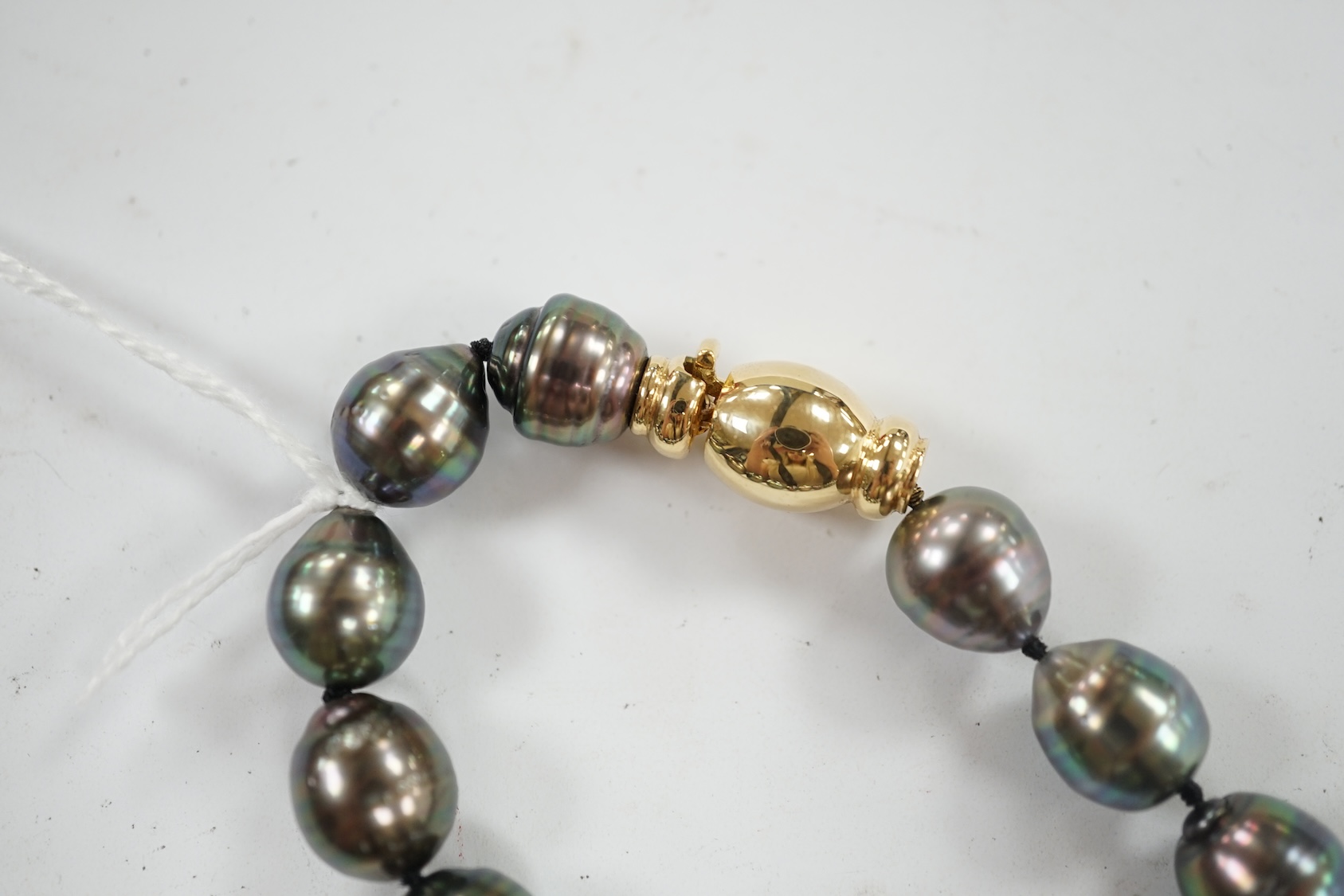 A modern single strand Tahitian cultured baroque pearl necklace with 750 clasp, 44cm. Condition - fair to good